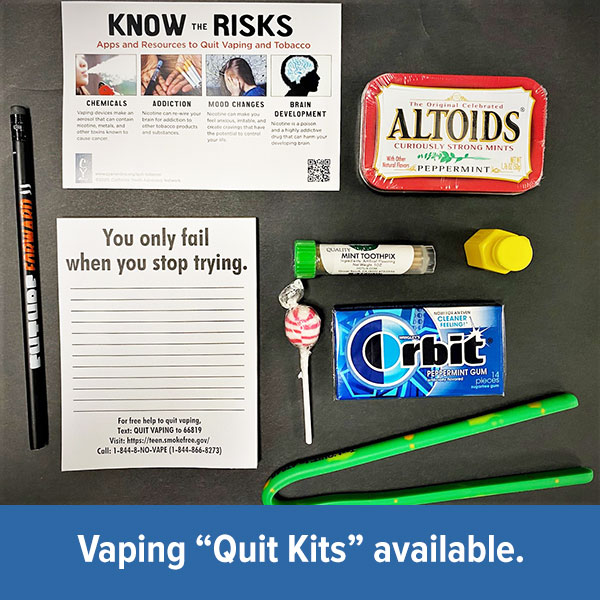 Photo of Quit Kit: gum, sucker, mints, toothpicks, information brochure, and more.