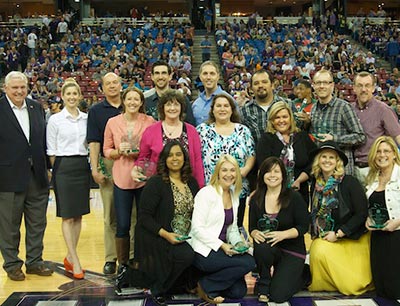 Teachers of the Year 2014 standing at center court