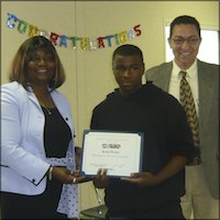 Student receiving certificate