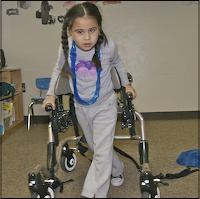 Student walking with assistive device