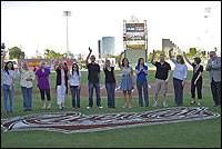 Teachers of the Year standing on Raley Field