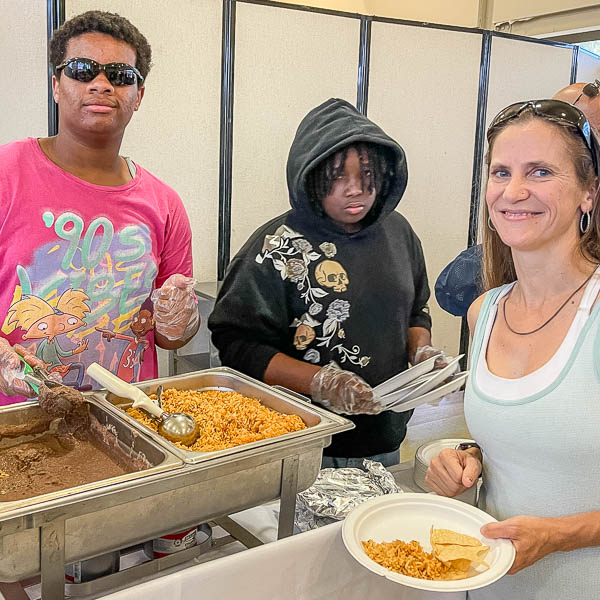 Students serving food