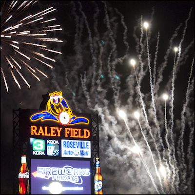 Fireworks behind Raley Field scoreboard