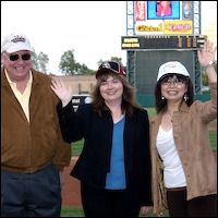 David W. Gordon, Cheryl Dultz, and Skye Mie Smith waving
