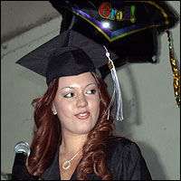 Graduate in cap and gown