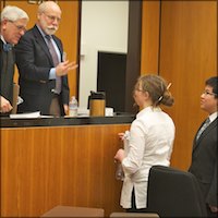 Moot Court competitors talking with judges