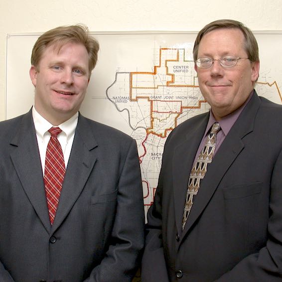 Chris Woods and John Scribner in front of district boundaries map