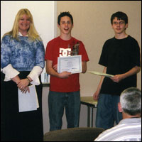 Students being presented with certificates