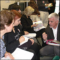 Educators consulting in the classroom