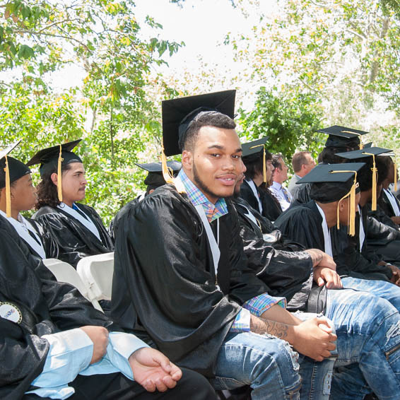 Students wearing black caps and gowns