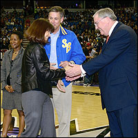David W. Gordon shaking hands with one of the Teachers of the Year