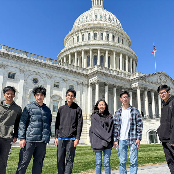 Students posing in front of the US Capitol