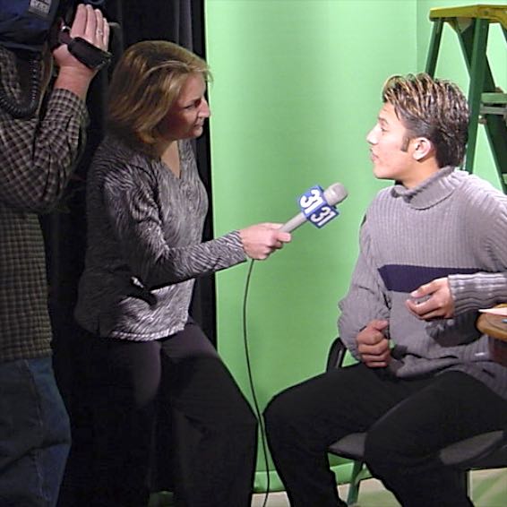Sandra Furlong interviews a student on the set