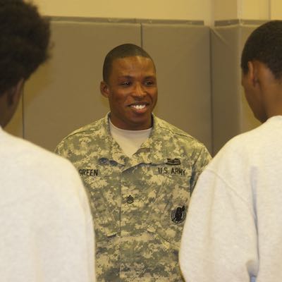 Army representative speaking with court school students