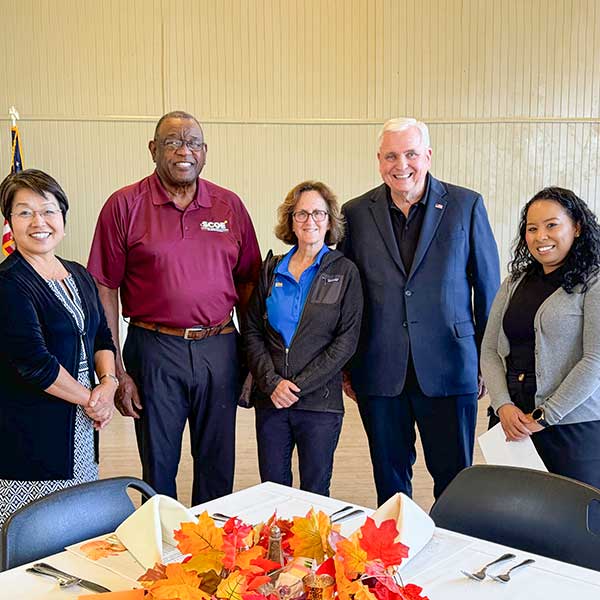 Board trustees with superintendent and deputy superintendent