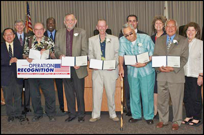 Operation Recognition diploma recipients posing with the Board of Education